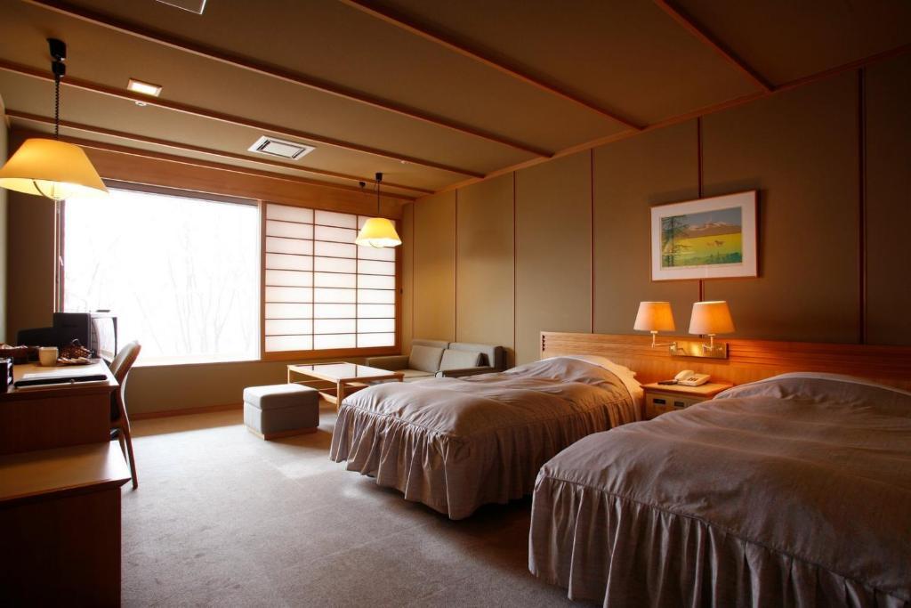 Shikotsuko Daiichi Hotel Suizantei Τσιτόσε Δωμάτιο φωτογραφία